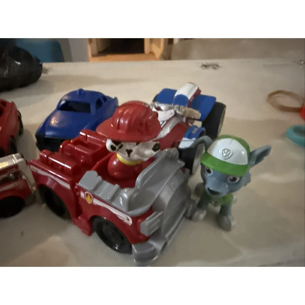 Random Assorted Paw Patrol Action Figures and Toys Lot of 7 Plus 2 cars